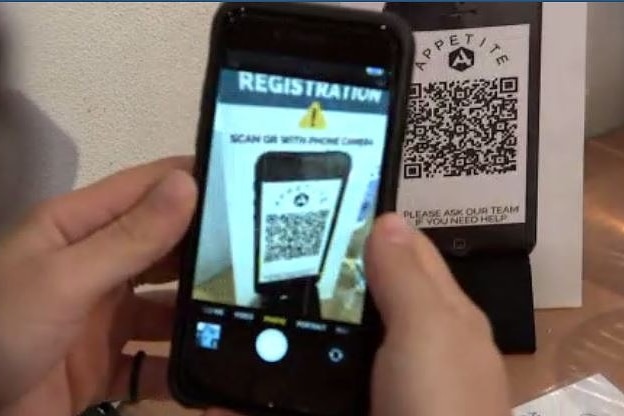 Person using a QR code
