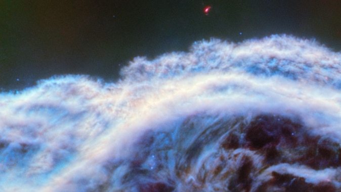 Detail shot of Horsehead Nebula's mane. It looks like swirling ocean foam. 