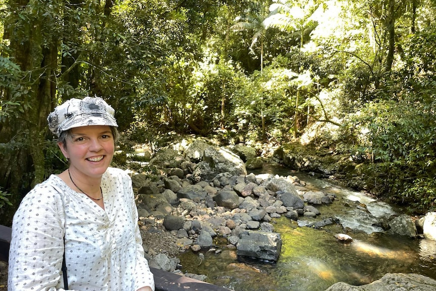 Woman in rainforest area.