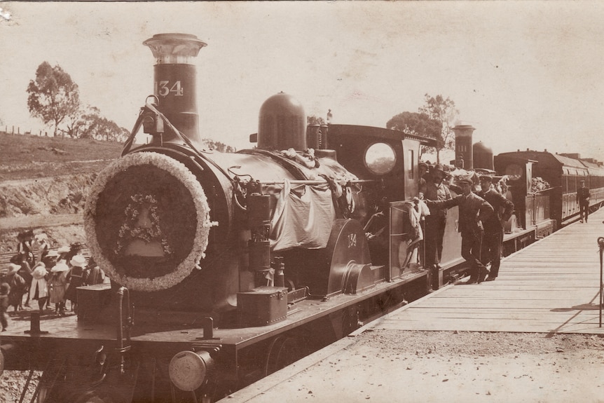A sepia photo of a steam train