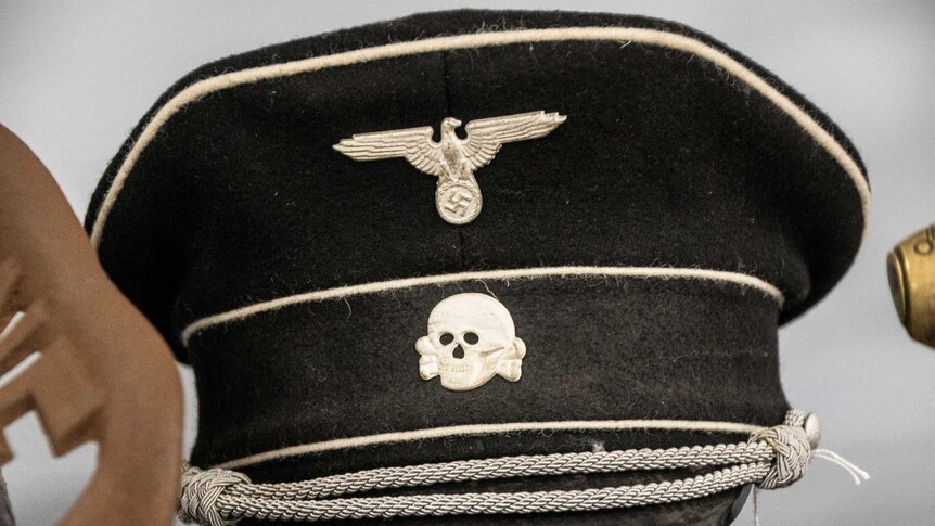 A military officer's hat with the SS logo.
