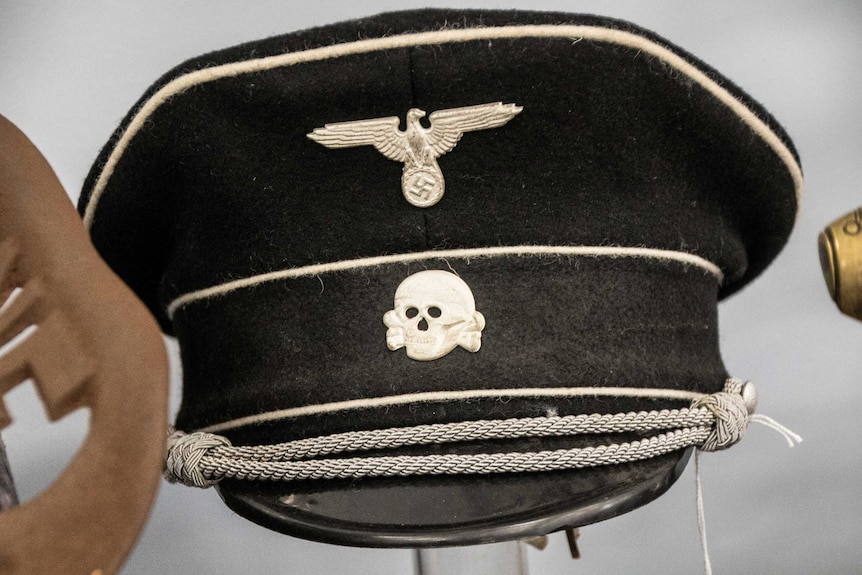 A military officer's hat with the SS logo.