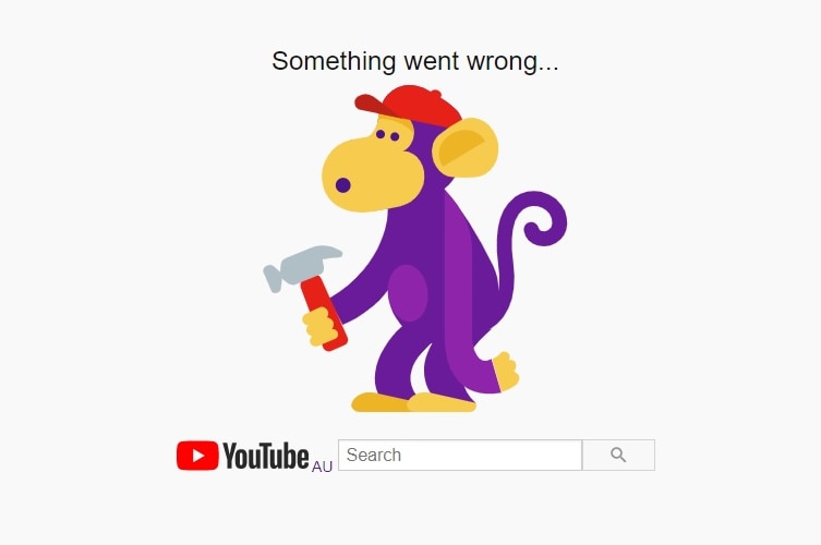 An error page for YouTube with a cartoon of a purple monkey holding a hammer and looking confused.