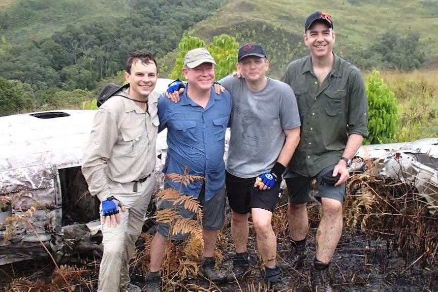 Trekkers with plane wreck