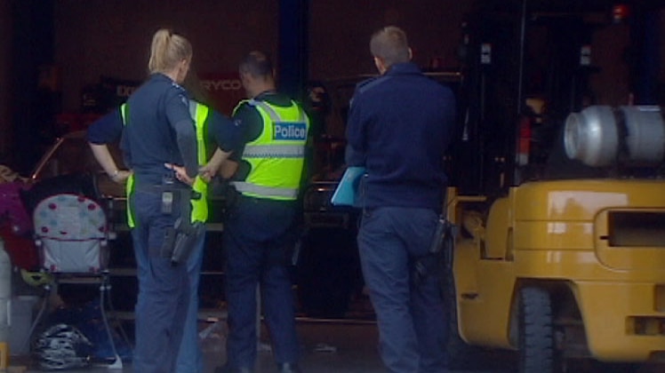 Police at scene of accident involving forklift and baby