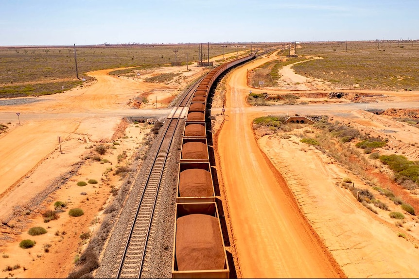 Image of a mining train heading into port.