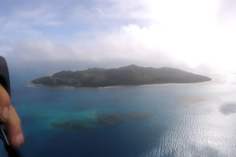 Gerbar Island in the distance as pilot records his journey over the Torres Strait