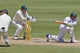 South Africa's Quinton de Kock (R) plays a shot in the first Test against Australia at the WACA.