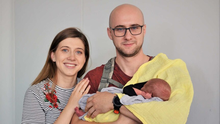 Belma Cancar with her husband Demir hold newborn baby Zeid