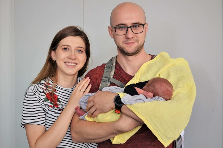 Belma Cancar with her husband Demir hold newborn baby Zeid