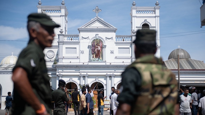 Security officers stand in front of St Anthony's Shrine in Colombo, Sri Lanka.