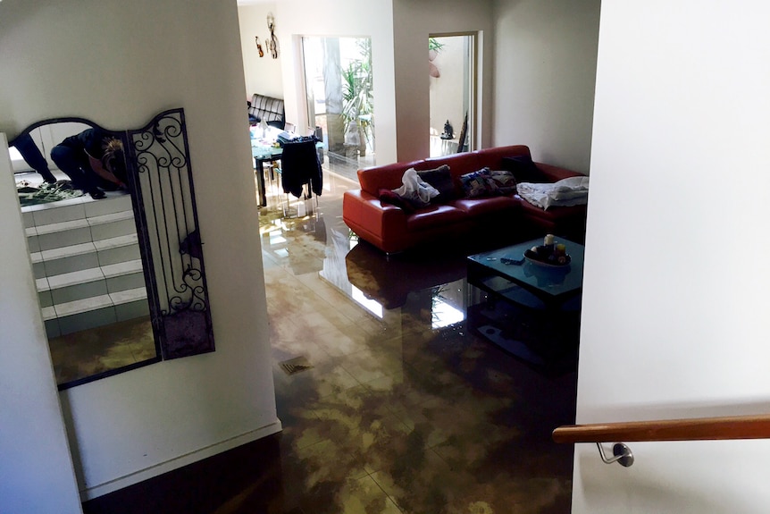 Living room flooded after Dulwich Hill water main bursts