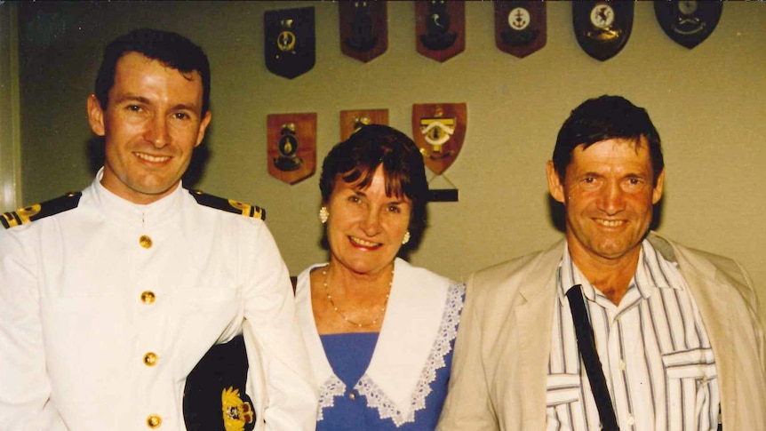 Mark McGowan in a Navy uniform pictured with his parents in 1995