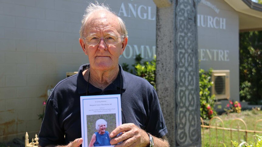 The nephew of environmentalist Margaret Thorsborne, John Thorsborne, stands outside a church and community centre.