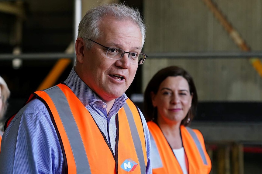 Deb Frecklington is seen during a press conference with Prime Minister Scott Morrison.