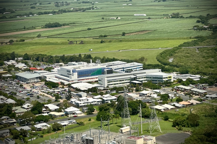 An aerial shot of a hospital complex surrounded by farms.