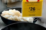 Defrosted prawns in a Coles display