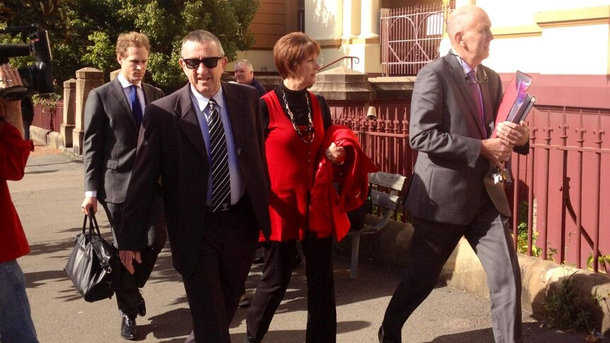 Catholic school principal William Callinan (front left) arrives at the inquiry into clergy sexual abuse in the Hunter Valley.