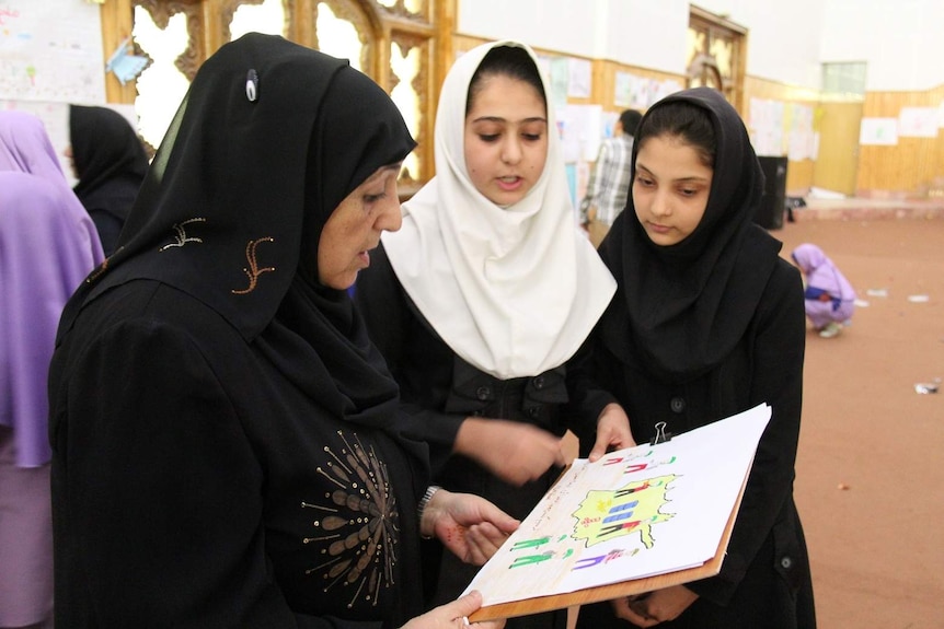 Sakena Yacoobi with female students