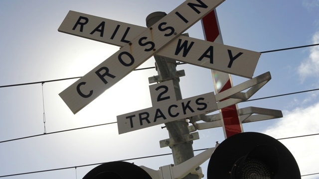 Newcastle Council calls for electronic signage at Adamstown Railway crossing, to let motorists know how they'll be waiting.