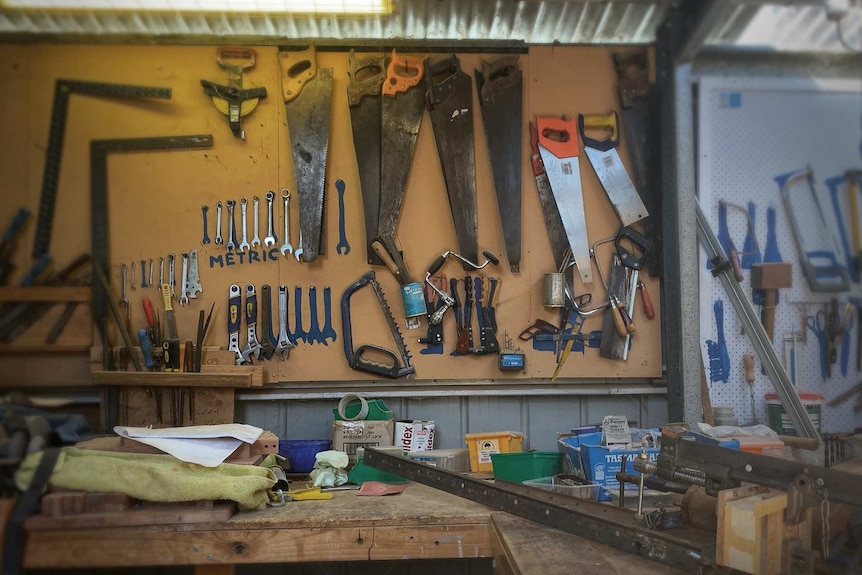 Tools hanging on a wall.