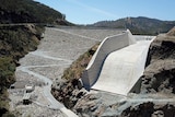 A concrete spillway from a dam.