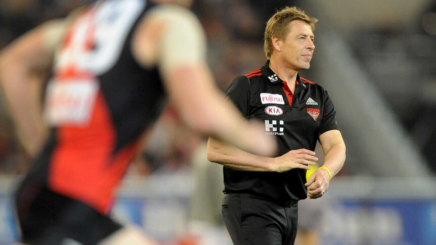 Essendon coach Mark Thompson on the MCG before the 2014 elimination final with North Melbourne