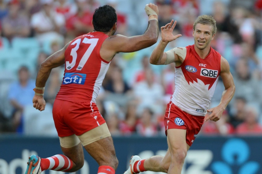 Swans celebrate felling Giants