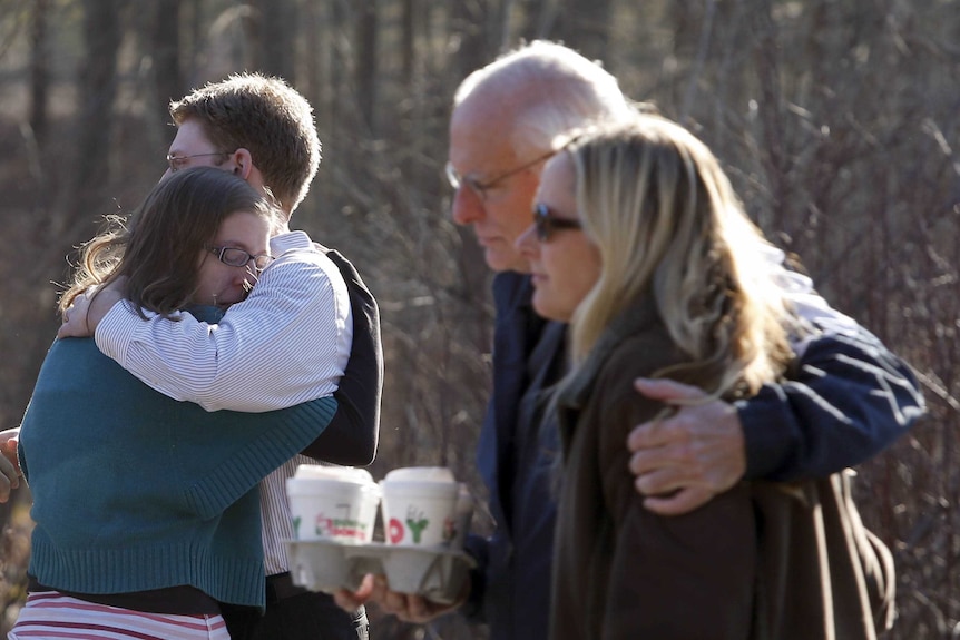 Family members embrace