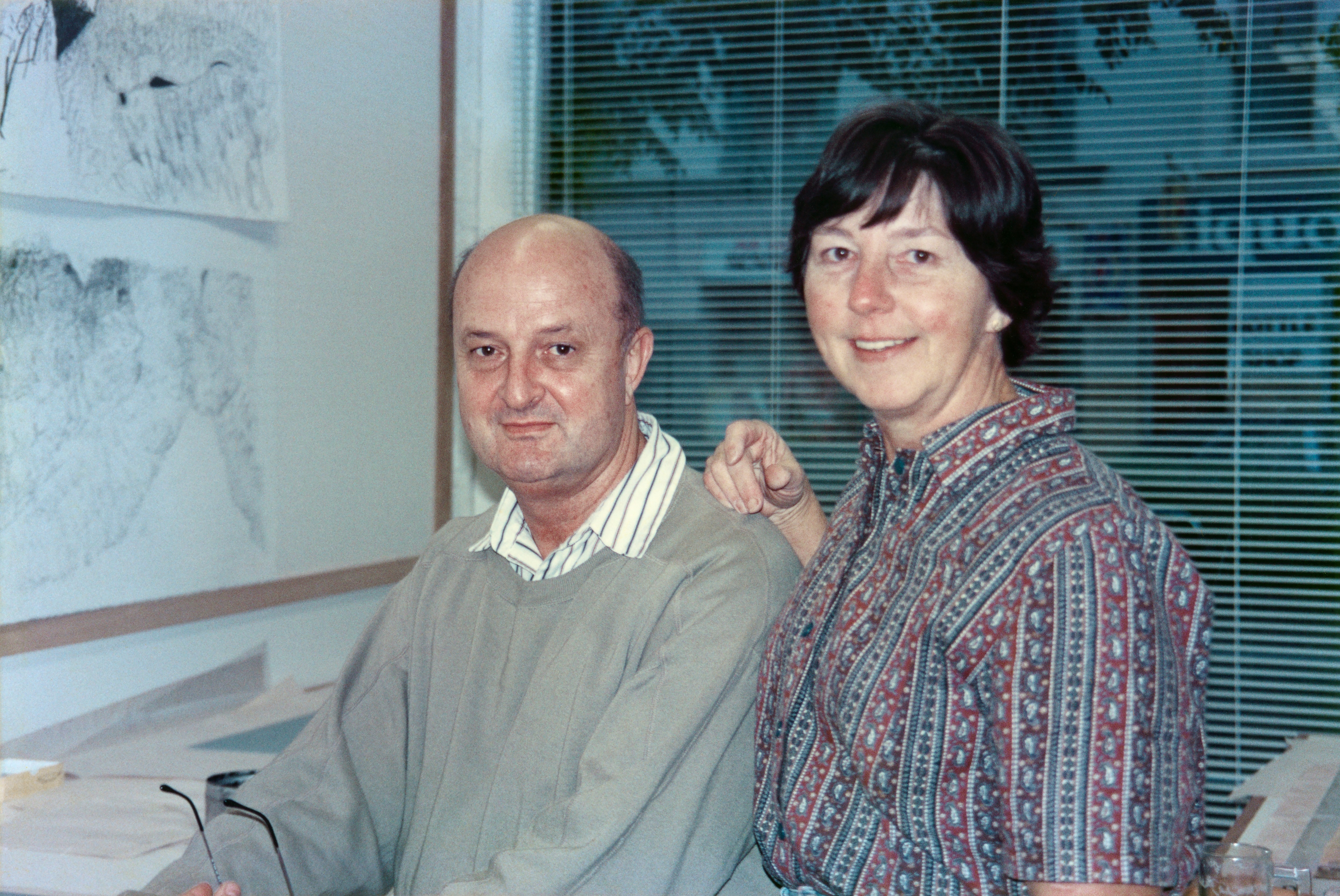 A man and woman sit together
