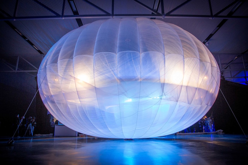 A Project Loon balloon in a warehouse
