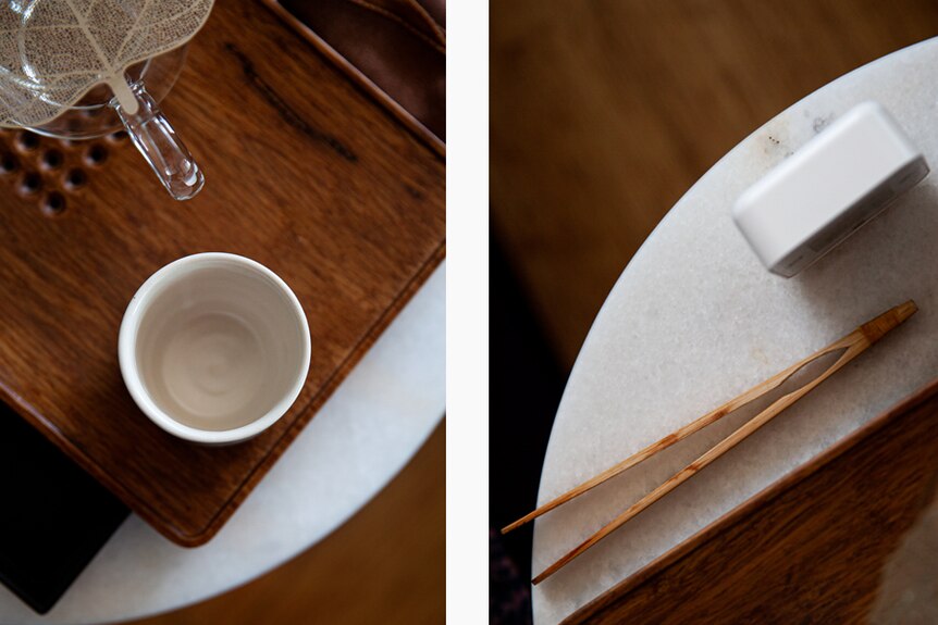 You view a diptych of two images showing tea making utensils pictured on top of warm wood furniture.