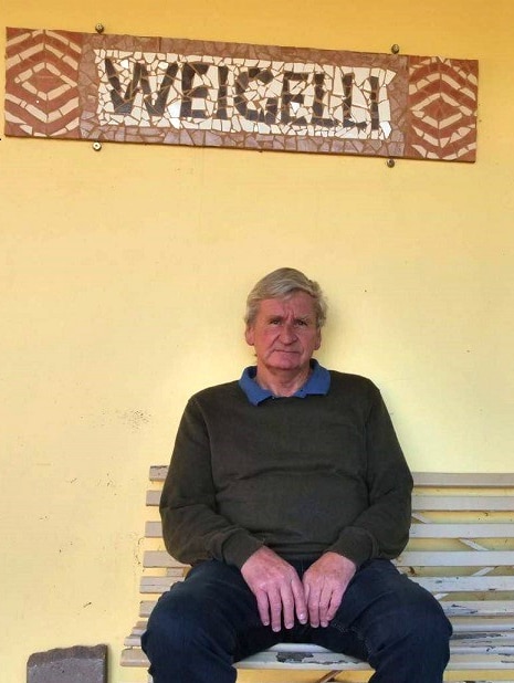 Case worker Norm Henderson sitting outside Weigelli rehab centre