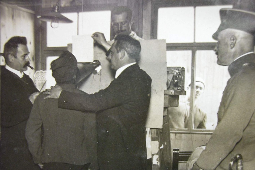 German scientists recording prisoners at the Wünsdorf PoW camp in Germany.