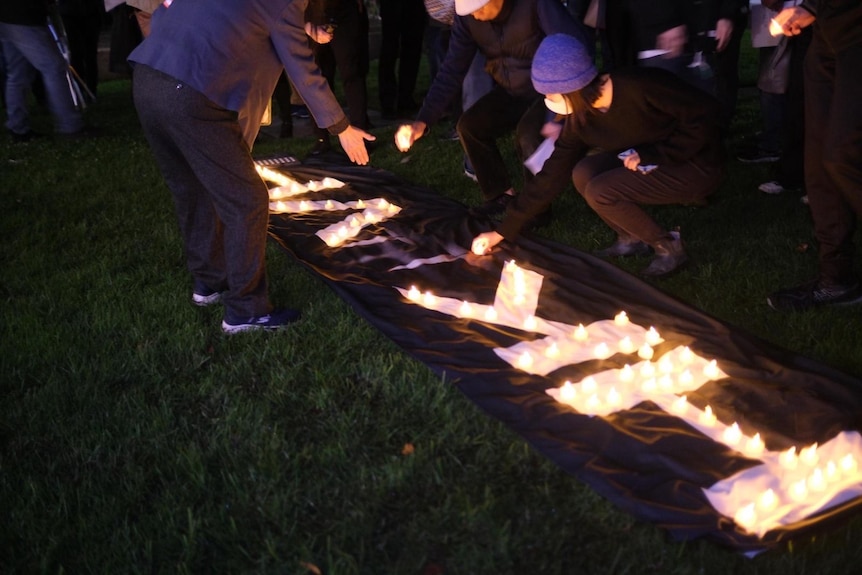 People light candles.