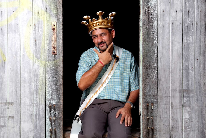 Monil Beotra of Rockhampton wearing the crown and sash he won as Mr Movember.