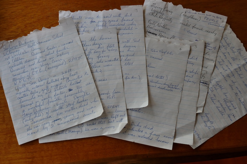 An image of papers containing handwritten notes. 