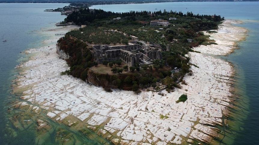 an aerial view of the peninsula of Sirmione at Lake Garda