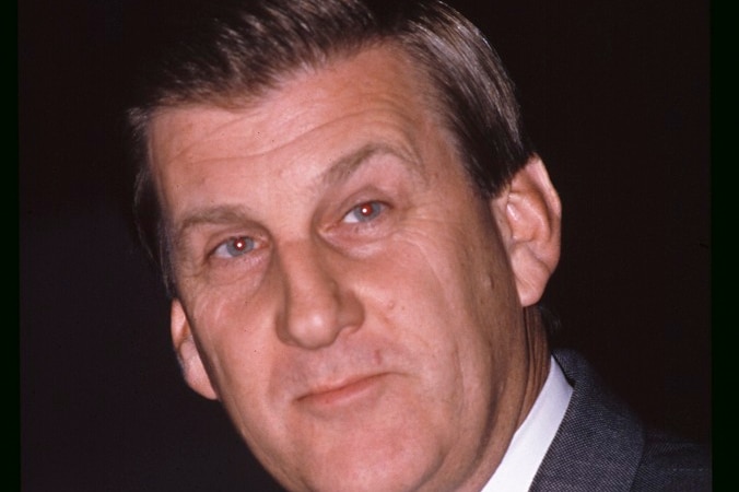 Jeff Kennett in a grey suit and black tie