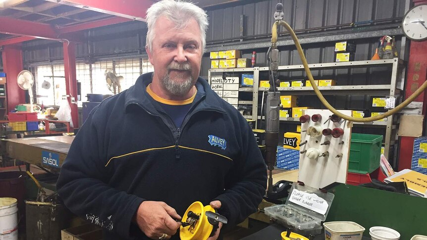 Employee Tony Robinson working at the Alvey fishing reel company in Queensland