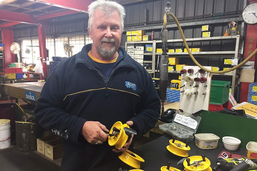 Employee Tony Robinson working at the Alvey fishing reel company in Queensland