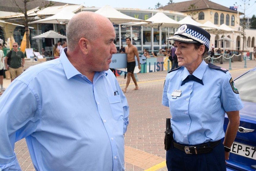 A man and a woman talking