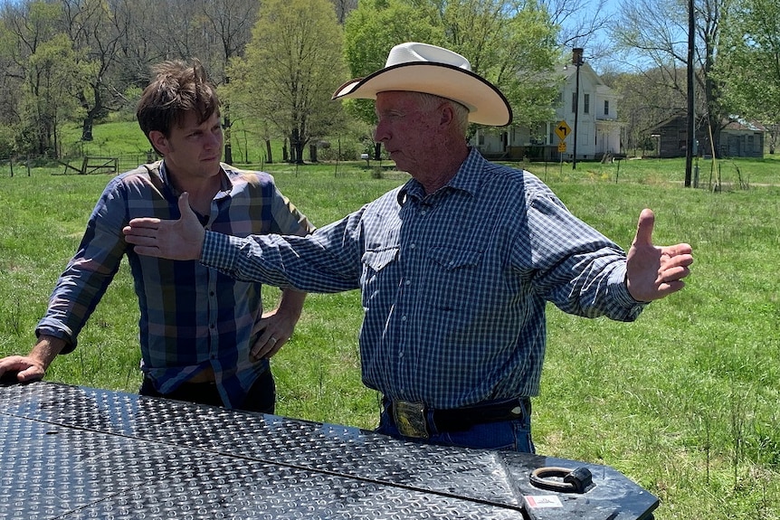 Craig Reucassel meets with Bobby Simpson (right), the president of the Missouri Cattlemen's Association.