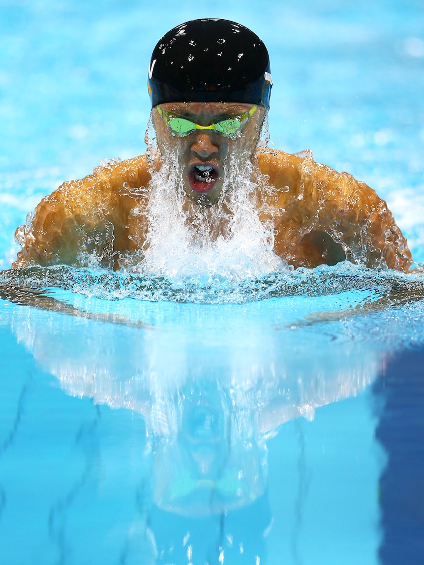 Kosuke Kitajima of Japan competes in the first semi-final heat of the men's 100m breaststroke.