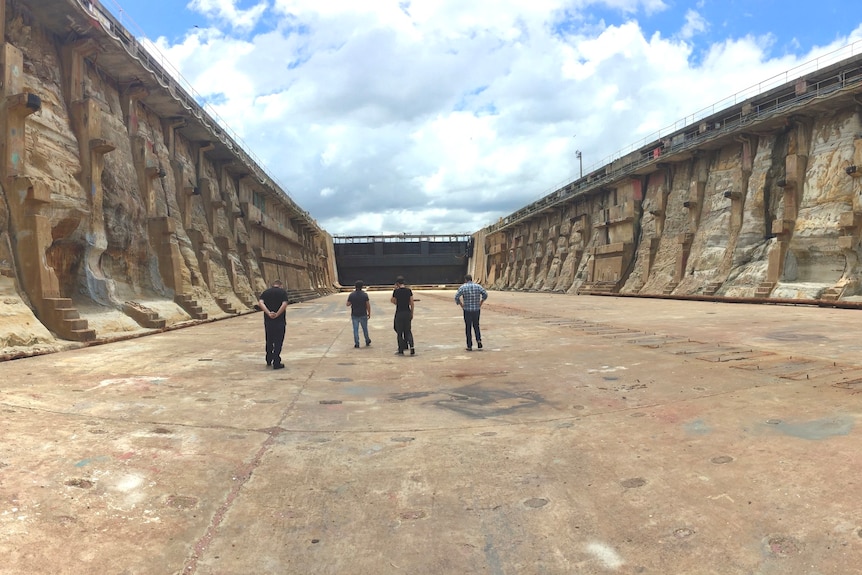 Large carved dock beside river