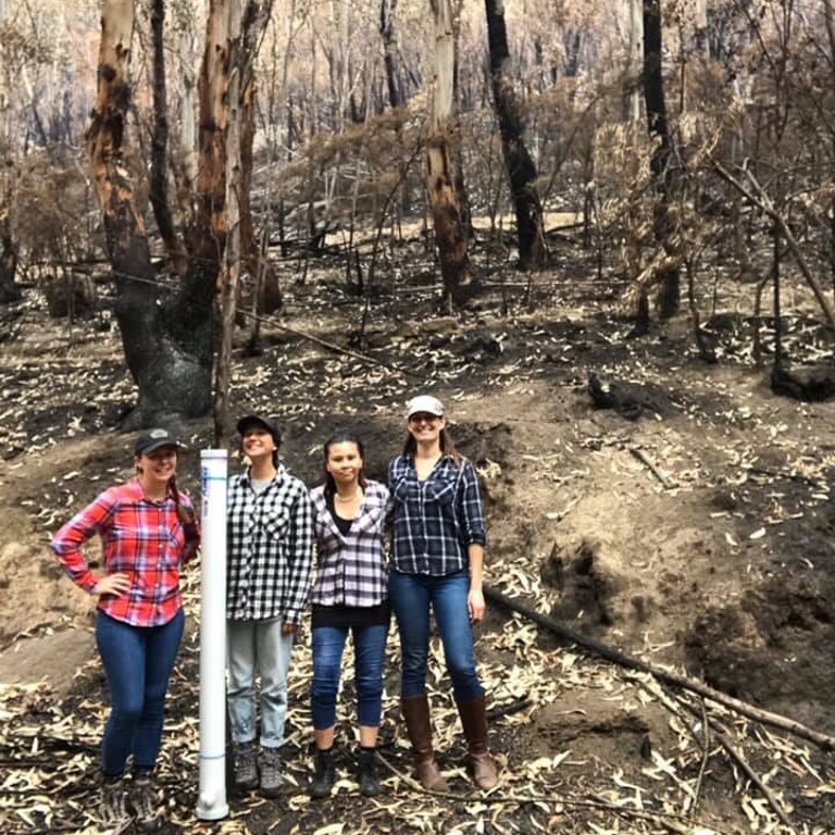 Allison Garoza and friends with a wildlife watering station at bushfire-affected land.