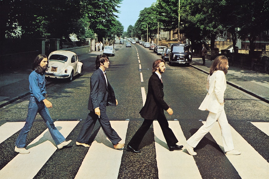 The iconic album cover of Abbey Road by the Beatles