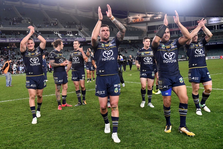Nth Queensland Cowboys players celebrate their win over Cronulla
