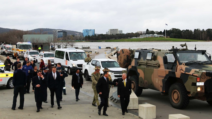 Lightning bolt convoy pulls up lake side along lake burley griffin in Canberra