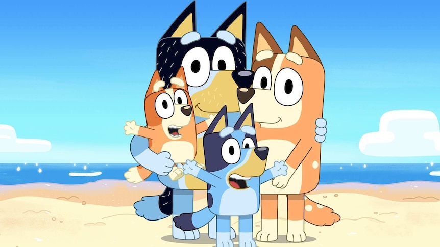 A cartoon image of the Bluey family with two parents and two kids all of whom are blue-heeler dogs